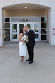 I tried on several dresses for my courthouse wedding and this one was perfect. I loved the strapless necklace, mid length with slit in back. I typically wear an XL size 14 and the XXL fit comfortably. Reasonably priced and felt like an expensive dress. Made me feel beautiful on my special day! - Cathalina P.