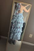 The elastic band that wraps around the back leaves a little too much breathing room for my comfort. It's a cute dress, but I'm not sure I'd wear it to a wedding where I plan to dance. - Kaylee P.