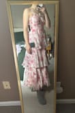 Zipper is a little tricky. Very little stretch in the material. Otherwise, the dress is super cute, and I'm excited to wear it to a summer wedding. - Kaylee P.