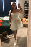 I bought this dress after buying a similar one on Selfie Leslie. Though the Selfie Leslie one was of better quality (boning on front and back, corset back, 3 layers under the skirt, more draped chiffon on neckline and sleeves) it wasn't white. This one is lovely, but there was a noticeable difference in quality (with boning only on the front, the stretch back, 1 layer under the skirt, and more of a thin cotton draping on the sleeves and neckline). However, when all is said and done, it came down to which one makes me feel pretty- which one makes me feel like a bride? And this one was the winner. I ordered a size XL based on the size guide measurements- I have a larger bust- but I think I should have gone with the large. Due to the looser fit on me and the lack of boning in the back, this dress is SO comfortable! I think it can be dressed up or down with heels or sneakers, and is perfect for bridal accessories like hair bows or veils. I plan to wear it to my bachelorette for a nice dinner followed by dancing! - Alexandria A.