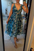 I love how this looked on me but it's was too tight to do anything in and it was supposed to be for a wedding where I planned to eat and dance. I'm about a size 8 and sized up as other reviews suggested, Large was so tight I could barely zip it and XL was too loose in the bust. It's so pretty I wish it had worked. - Ana R.