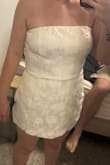 Super cute! Little large on bust but easily adjustable with the tie back. Definitely need someone to make the bow look pretty on the back - Kristin W.