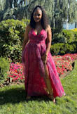 The dress is absolutely beautiful. The colors are vibrant and very flattering. I ordered both a Large and an XL due to time constraints. Unfortunately, the zipper on the Large wouldn't go up, so I returned that one. Shipping was fast, and the return was processed quickly, though a return fee was deducted.

As one reviewer noted, the neckline on the Large was more of a U-shape than a V, which I also found to be true. I had my cleaner adjust the neckline slightly. I love the dress length. It's elegant without being too formal.

Overall, it's a classy and stunning outfit. I'm very pleased with the purchase. - Tracey A.