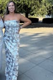 Really shocked how comfortable this dress was. Got so many compliments. Wore this for my little sister's quinceañera. I would say it's true to size - Alina D.