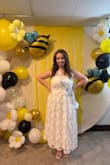 I wore this to my bridal shower and it was perfect! I got compliments from everyone and felt amazing. I ordered a size larger than I usually do based on the recommendations, and it fit great. It's very flattering. - Allison L.