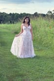 Beautiful pink toile dress. I did have to alter the straps (they were too long, even on the tightest setting) and hem the bottom as the dress was too long even with 3-inch heels. However, it was beautiful after these alterations! - Natalie N.