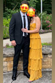 I wore this dress to a black tie optional wedding and it was beautiful. I got lots of compliments on it. I could have sized up to a small, the bust area was tight, but it wasn't bad because I liked the extra support it felt like it gave me. I would've purchased it in blue, but that was the color of the bridesmaids dresses! The yellow was still such a gorgeous color. I am 5'5 and I wore 2" heels, and the dress touched the ground only a little bit. When I put on flip flops on the dance floor I had to grab the dress with one hand the whole time. - Vanessa B.