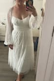 Very flattering and feminine. I love the simplicity but also feels fancy and flows nicely. Bought this for my bridal shower and will be using as my second dress - Christine J.