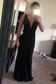 I was very skeptical about this dress after reading the (somewhat) mixed reviews. I've always been in between sizes (small and medium) so I never know what size to order. But, I ordered this dress on a whim because it was only sale for $25! I'm so glad I went with the small, it fits perfectly. There's not much length so for us taller girls, expect to wear a shorter heel. I'm pretty hippy & have a larger chest but the fabric is pretty flexible. - Ali P.