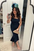 So, I agree with the other reviews on this dress. Lulus is geared toward 5'10" ladies. That being said, if you pick accordingly, you will have little to no alterations. This dress is labeled as a midi, but on me it's a maxi which worked due to the high low aspect. Also, I did have to shorten the neck straps about 3 inches. Overall, the dress was very comfortable. I did find that the back seam along the top of the dress rolled down a bit, which I found to be a bit distracting. I wore if for an underwater themed high tea. Anyway, I'd def recommend to those who either don't mind altering their clothing or those who are at least 5'8" or have a longer torso. - Kelley J.