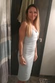 The dress is perfectly snug, but a little difficulty getting the zipper up all the way. Length is great, just below the knee. The fabric is medium weight and made well. The blue is a bit lighter than expected, but still beautiful. I wiuld like to order other colors. - Stephanie A.