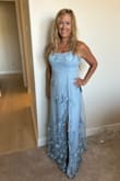 The fit is slimming! It's a very light material and flows. I don't even need to hem it. I am the Mother of the Groom and looked everywhere for a dress for the beach. According to the size chart, I was a small/medium, but I needed a large. This is the perfect dress! - Darlene H.