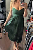 Very pretty dress, but did not work for large breasts. There is no stretch in the top section. - Stephanie H.