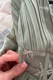 Dress arrived while on vacation, it was damaged upon delivery, and when I finally went to request a return, it says I cannot return because it's been longer than three weeks, and that's super frustrating because most places allow a month. - Alisa A.
