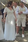 Love the dress, very pretty and comfortable. I have a belly right now from being pregnant so I sized up 1 and had it altered so waist seam sits above my stomach now. - Courtney M.