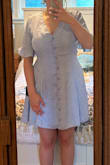 It said my best size would be medium, but I previously owned this dress in yellow and outgrew it once my bust grew. I would definitely size up for a larger bust. Since it's button-down, I always size up more than my regular size, and it was the right call going for the large. Fits perfectly! I got it for a baby shower. - Maggie J.
