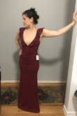 I love it! Super low neckline, but I'm fairly flat-chested so it still looks classy. Fits like a glove and the color is true to the image. - Dana K.