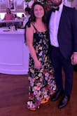 I absolutely loved this dress and got so many compliments at a recent black tie wedding! I would have ordered a Large based on the measurements, but it was sold out so I took a chance on the medium, and it fit perfectly. It was a little more form-fitting so I think the large still probably would have fit, but just would have been a little looser through the waist and hips. My only complaint was that some of the little yellow flowers were only very lightly sewn on, so they folded in half initially, but I reinforced them a little bit myself, and they held up much better. - Jordie L.