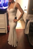 I will be wearing this dress for my small outdoor wedding ceremony. It's long on me, and runs a little small, but will work perfectly for my big day. - Amanda P.