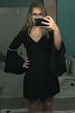 My first dress I ordered and I absolutely love it! The material was heavier than expected but not uncomfortable at all. It's soft on the outside and silky on the inside. - Grace Q.