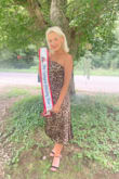 Got so many compliments on this dress! I wore it to judge another pageant. I got a size medium and it was a little loose in the back, but wouldn't change the size. My first purchase from here and won't be my last! - Holly E.
