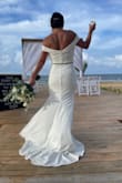 I absolutely loved this dress for my wedding.  I received so many compliments.  Everyone said the dress fit me like a glove, like it was made for me. I did have it hemmed due to my height, I'm 5'2". I added a belt for the perfect sling accessory. - Mary F.