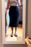 I was on the fence. It's soft and a good length, but not the most flattering. The waistband is what you would expect, but the rest of the skirt doesn't have the weight or compression to flatter. It goes over your hips like a sweater meant for the top, not bottom. I kept it because it's practical and comfy. Don't feel confident in it. - Marline K.