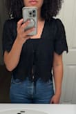 I was so excited about this top! It's cute in and I love how feminine the material is. I took the tags off, wore it for the first time, and the left sleeve ripped as I lifted my arm up. The right arm is still intact after the exact same movement. The top didn't fit snug when trying it on, which is why I kept it. I'm really bummed about this, given the price point. - Cierra C.
