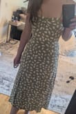 Fits great, not too tight, not too loose. I am a little wide shouldered so sometimes spaghetti straps aren't flattering on me, but the square neckline cancels that out. This dress could be "dressed" up or down, casual or fancy. Love it. - Arianna W.