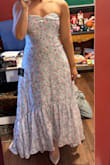 It fit like a glove in a medium, but returned only because I don't think strapless dresses are flattering on me, and neither was this color. Otherwise, it's beautiful and just like the picture. - Ada T.