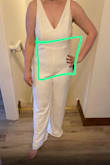 The jumpsuit is made of good material and the bow in the back is lovely, but unfortunately the front lets it down with how the material is sewn together. The sequins do tend to fall off the dress which I've noticed walking around the house. I won't be wearing this outfit for my bridal shower as I don't feel it's worthy of that, but I will keep it for a dinner, etc. - Jennifer