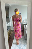 Pretty dress for a garden wedding. A lot of compliments. I have small boobs so slid down a little. Was able to wear a strapless bra. - Amanda F.