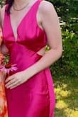 I'm so glad I got this dress! I love the color, design, and fabric! I got compliments all night, and I truly felt beautiful. 

Some minor things to note: The top of the dress was loose on me despite ordering a small, but I also have wide hips and a smaller bust, so I'm not too surprised by this. I used some fabric tape on the top, and it worked for the most part. I'll likely get the top part altered later. The fabric also wrinkles easily, but that's to be expected with silk.

All around, truly a great purchase! Highly recommend :) - Courtney R.