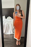 This dress is FAB. It's true to size, gorgeous color, so comfortable and flattering, mildly stretchy but with a thick material that doesn't cling or squeeze. It was perfect for my event, and the dress received so many compliments. I honestly can't wait to wear it again, and I would absolutely recommend. - Amanda B.