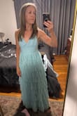 This dress is beautiful and fits me perfectly, even though I'm super small on top. The quality is good and the color is so pretty. Good length too. Highly recommend. - Karen C.