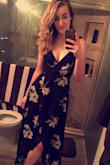 This dress fits perfectly, it is so flattering and definitely true to size. I was worried that it would run too short to wear with heels, being that I'm taller, but it's perfect! I will be wearing this for an outdoor wedding so I'm glad it's long but not too long that it would drag on the ground. The material is very good quality and the details are the straps are so cute! HIGHLY recommend!! (My phone put a filter on the photo so the color isn't more vibrant in person) - Lynne D.