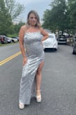 This dress is so perfectly fit and absolutely gorgeous. I got so many compliments the whole night. The slit comes at a perfect length the dress is long so you may have to get it altered but I wore big enough platforms to avoid that. - Valbona S.