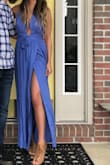 I received so many compliments on this dress! It was about 3" too long, I had to pair it with heels so I didn't continue to step on it. In my opinion, an XS would have worked better for my body type than the S I purchased. The material wrinkles easy. It looked more like a maxi than a wrap dress on me, unless I made an effort to show my leg posing in a photo (e.g. the photos I added). Wore an adhesive bra and fashion tape to ensure I stayed in the dress! Super flattering, and comfortable. - Kelly B.
