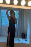 Ordered a S. Fit feels SLIGHTLY snug but only in the lower half of my body. No bra needed, fits chest and waist perfectly. The slit is a little higher than I expected, but that may be because it was tighter around my hips/butt. I also thought the bottom half of the dress was flowy, but it's actually straight. The material is thick enough and very comfortable. will be wearing to a wedding next month! - Shauna P.