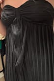 This dress was cut very weirdly right under the top portion is not proportional, and looks awful. Couldn't return anymore - Jordan M.