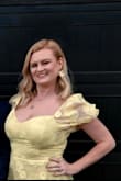 I bought this dress for my nephew's communion. It runs true to size, looked like the picture, fit my large bust nicely. The color was a nice vibrant yellow. Great for taking photos!! - Heather M.