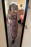 I really like this dress! I'm happy with the fit. It does run slightly tighter as a whole, but it's so cute! The colors are beautiful - Tara W.