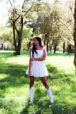 I wore this white dress for my senior pictures, and I couldn't have picked a better outfit! It was simple yet stunning. The fit was flattering in all the right places, and the fabric felt soft yet structured, perfect for staying comfortable during my photoshoot. What really stood out was the attention to detail; the stitching was clean, and it had just the right amount of flow. Whether you're wearing it to a summer party, brunch, or something more formal, you can dress it up with a classy pair of heels, or dress it down. Highly recommend if you're looking for a white dress that makes you feel effortlessly chic. - Adriana K.
