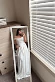 Ordered this dress for my save the date photoshoot, and it did NOT disappoint! Other than the bust area being slightly too loose because I'm a B cup and lack in that department, everything else fit beautifully! The quality is a high-end material, and very thick! There is quite a bit of material on the bottom lengthwise, so if you're 5'7 or shorter, you're definitely going to need to get the dress tailored! Overall, highly recommend getting this dress, feel like a little princess in it <3 - Mariah M.
