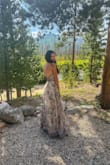 I bought this for my daughter's wedding in the Colorado mountains & it was absolutely perfect! I got so many compliments & felt so comfortable in it. I will say it is a tad long. I'm 5'6 & it probably needed to be hemmed or I needed higher heels, but it still looked stunning. - Vicki D.