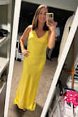 I received so many compliments on this dress. Everyone knew the reference, too. The fit was perfect. I didn't need any alterations.  I usually wear a size 6 S/M. - Regina L.