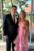 The top of the dress was a little tight. I'm a 34 C. I wouldn't change the size. If I ended up getting a size medium, it would be too big. I got so many compliments on the dress. It was very comfortable, and it's a perfect dress for an event. - Amber A.