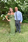 This dress was so flattering/forgiving. After just having a baby, it was the perfect dress to hide my mid section. It does run long and would have hemmed it, had I ordered it sooner. - Jodi U.