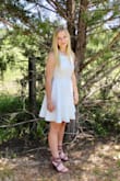 MY DAUGHTER WORE THIS DRESS FOR EASTER. IT WAS PERFECT AND LOOKED GREAT ON HER. THE BACK OF THE DRESS IS SO PRETTY. SHE AND I BOTH WERE VERY PLEASED WITH THE WAY IT FIT. SHE RECEIVED MANY COMPLIMENTS. - Christy T.
