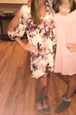 This dress fit true to size and was very comfortable. I loved the design and how you can choose to wear it either casually or formally! - Emma K.